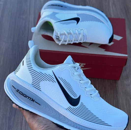 CHAMPIONES NIKE ZOOMX RUNNING