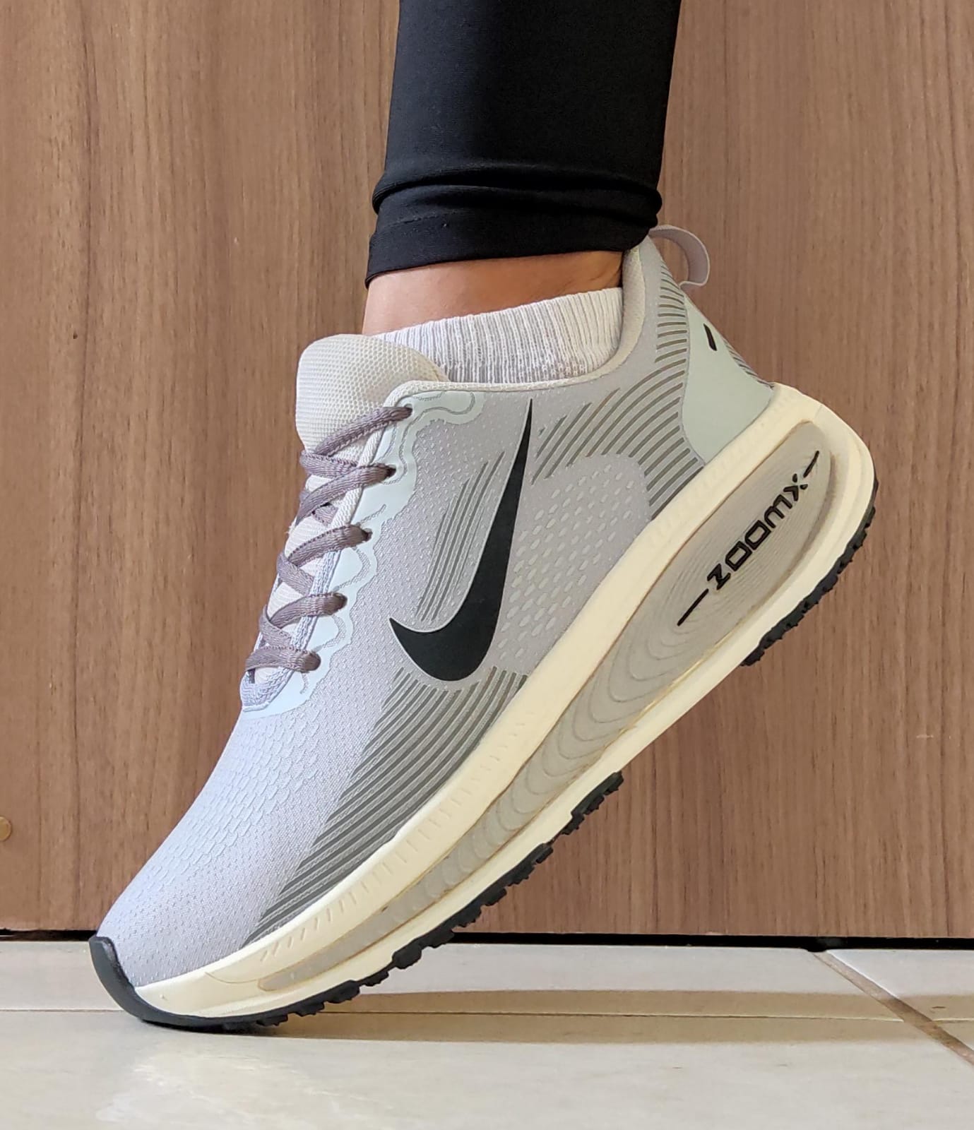 CHAMPIONES NIKE ZOOMX RUNNING